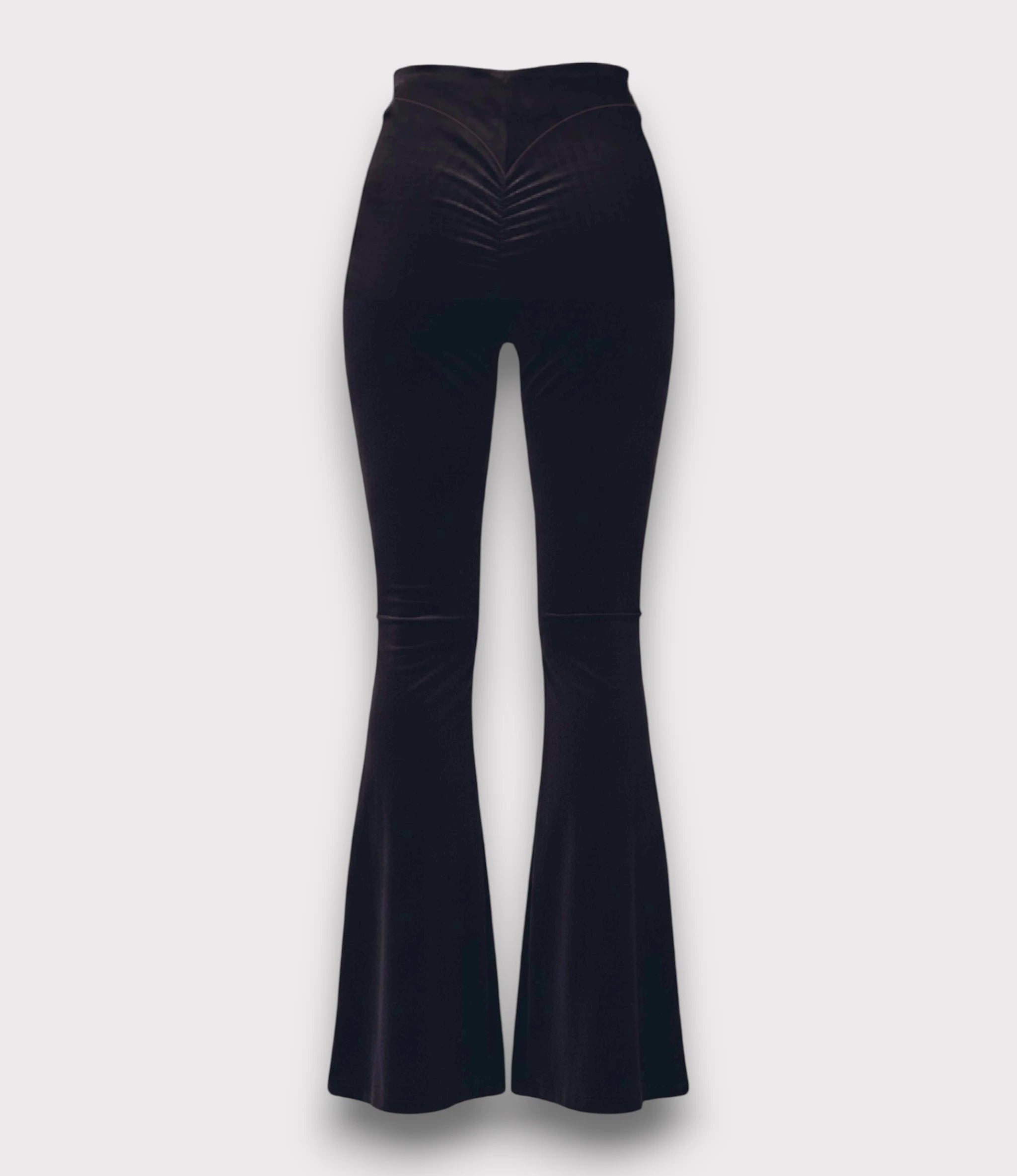 Black velvet bell bottom pants on a light gray background